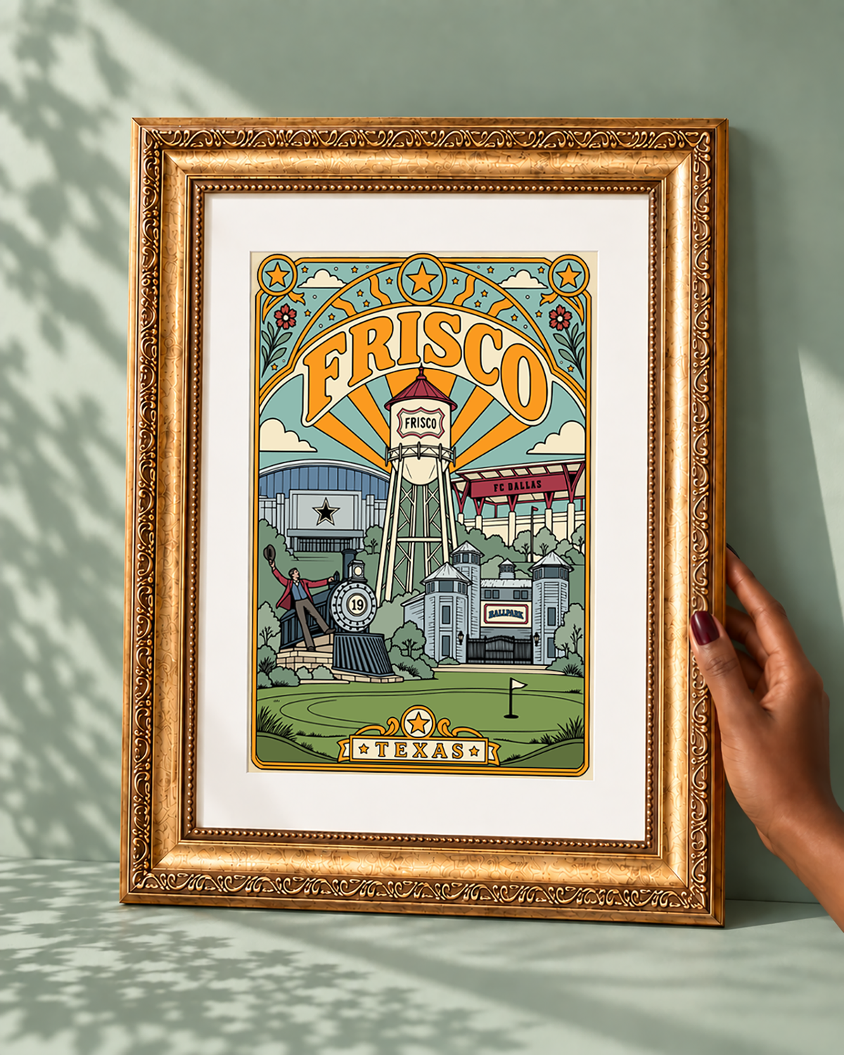 Frisco Texas wall art displayed with a white mat in an ornate antique-style gold frame.