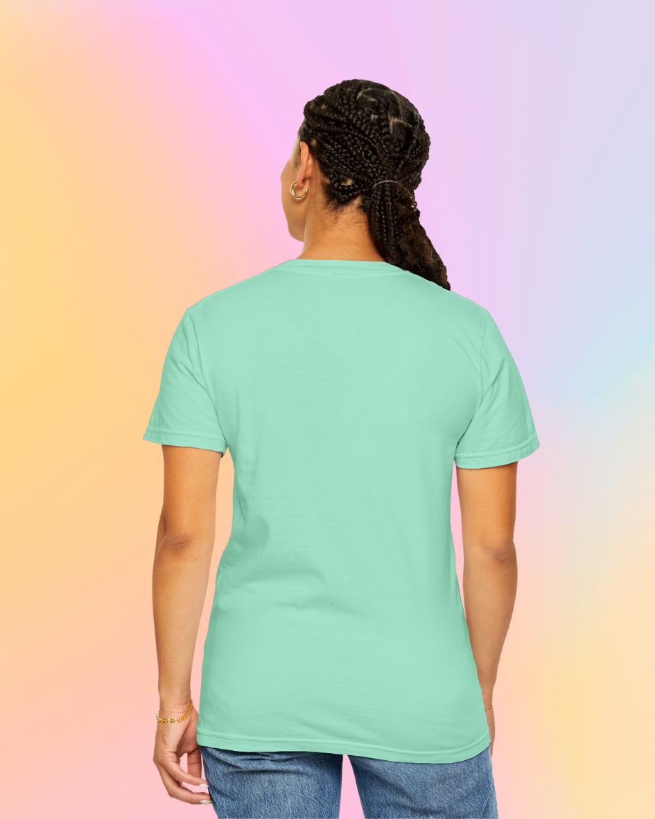 Back view of mint green Full Moon Goddess classic t-shirt on model showing relaxed unisex fit.