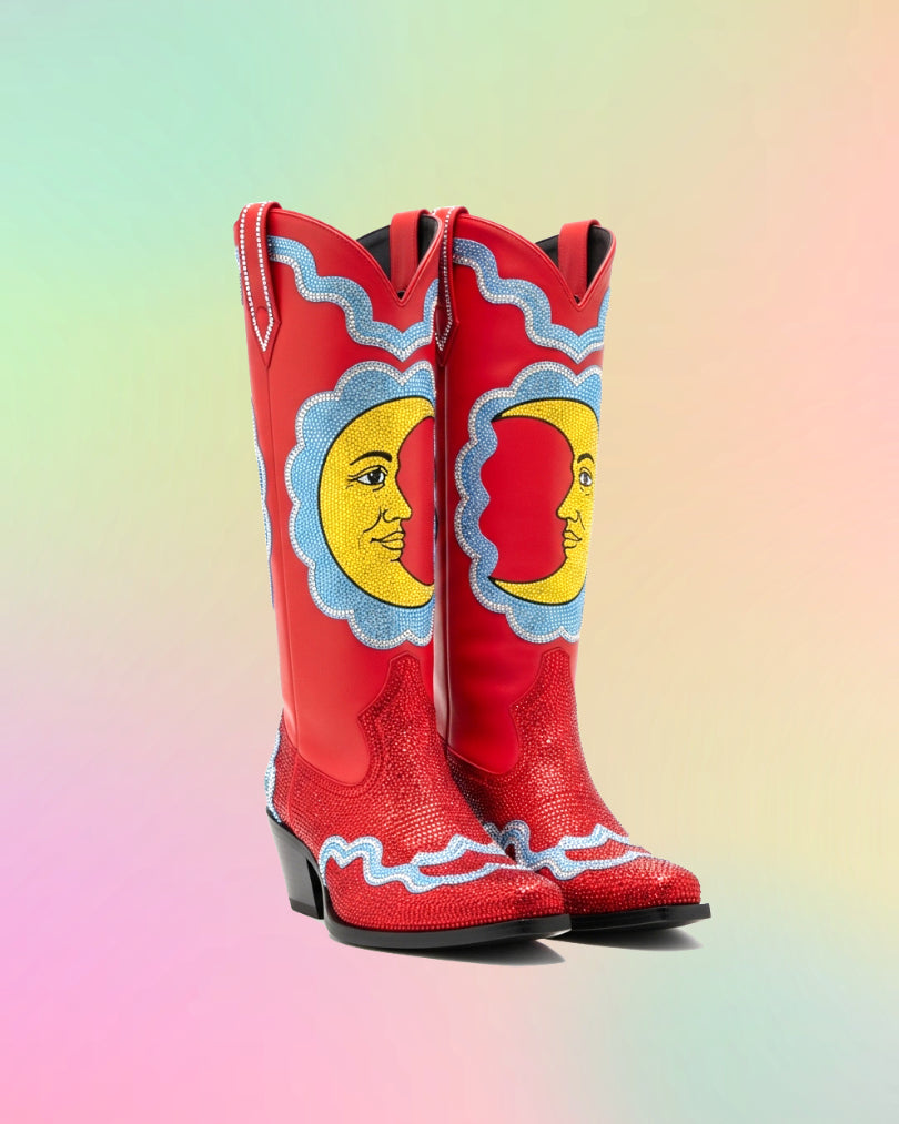 Front view of red hand painted knee high cowboy boots with yellow moon design and blue accents.