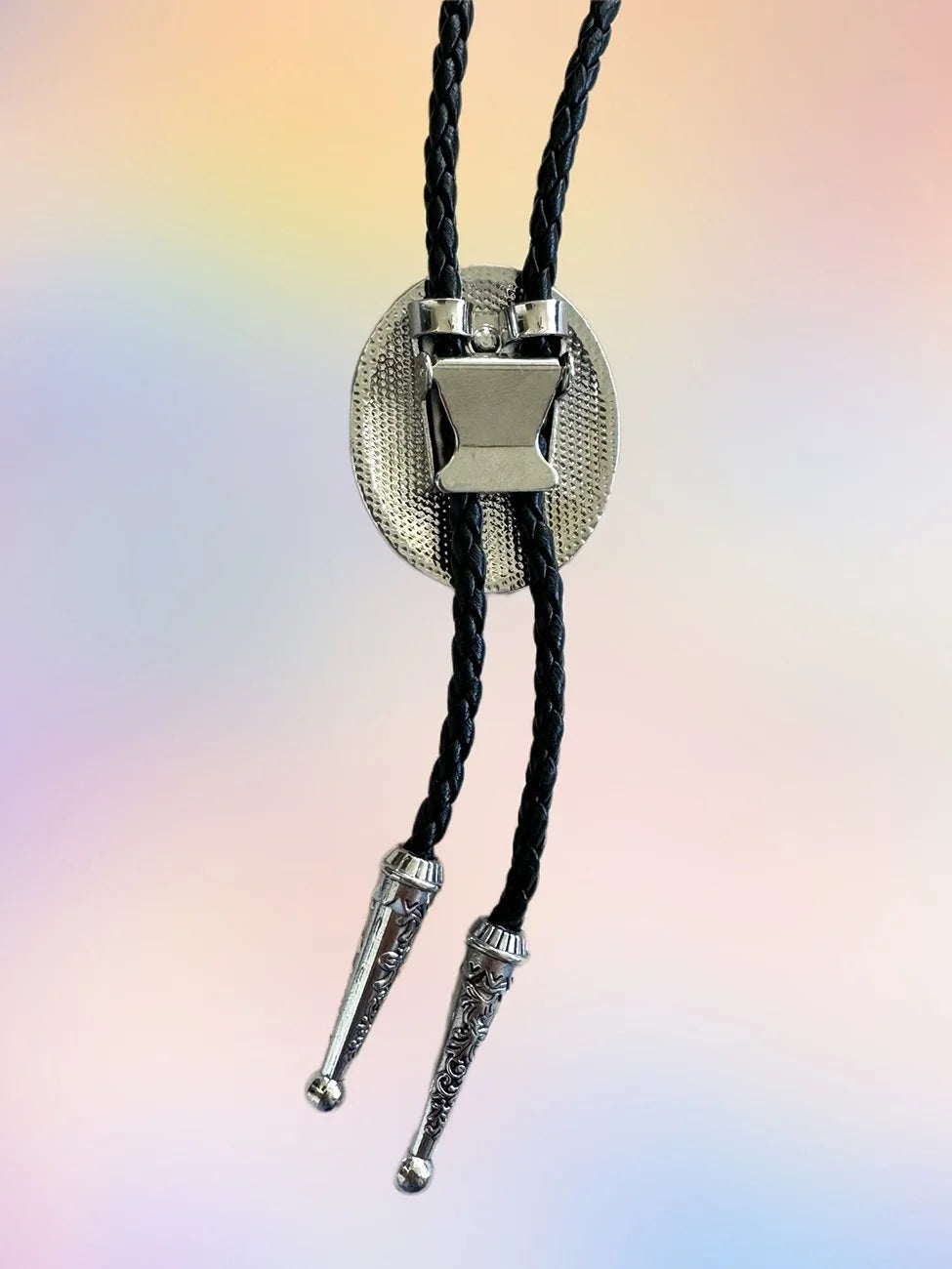 Back view of the Teal Twilight Bolo Tie showing the silver clasp hardware and braided black rope.