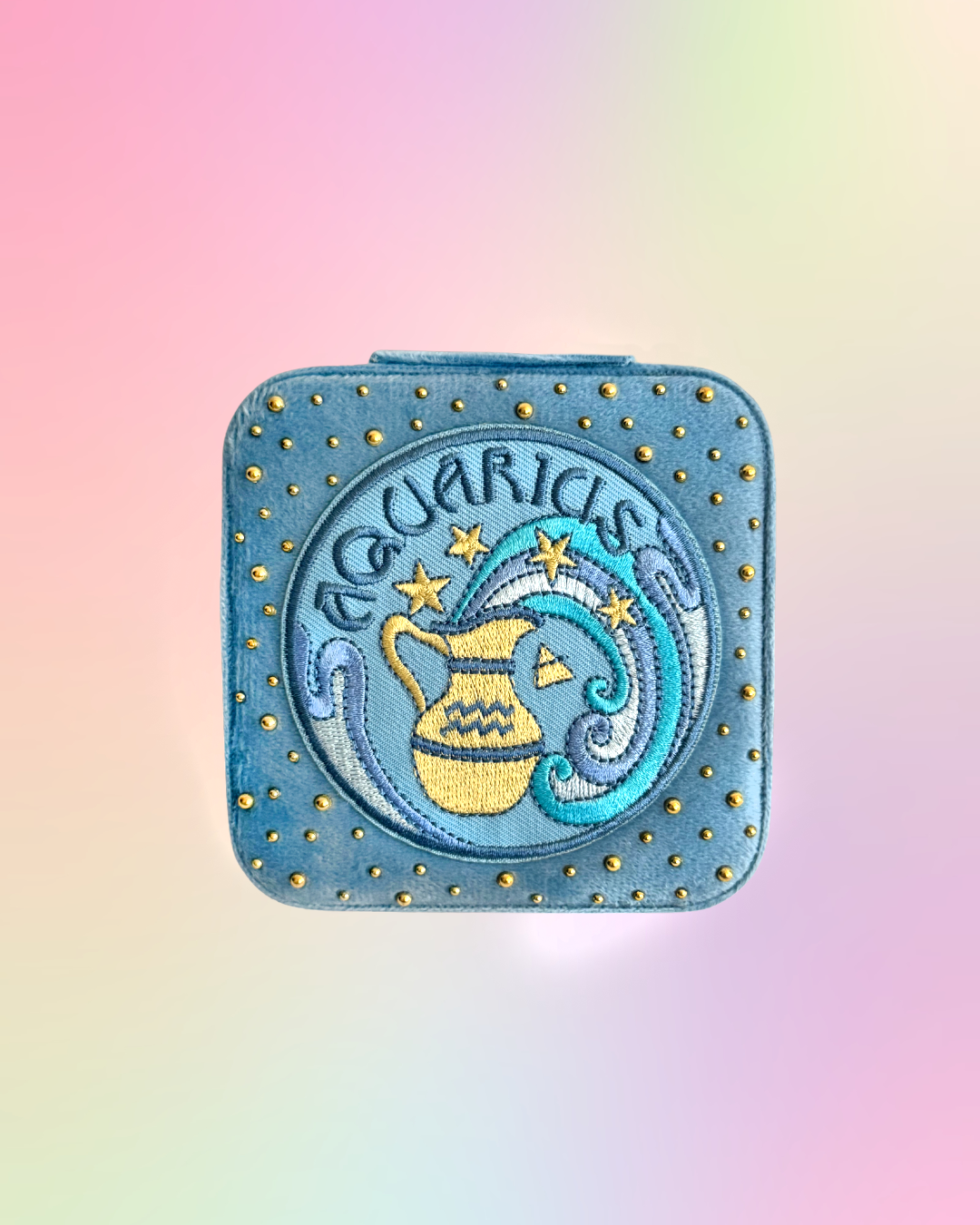 Aquarius velvet zodiac jewelry box with embroidered zodiac patch and gold rhinestone details.