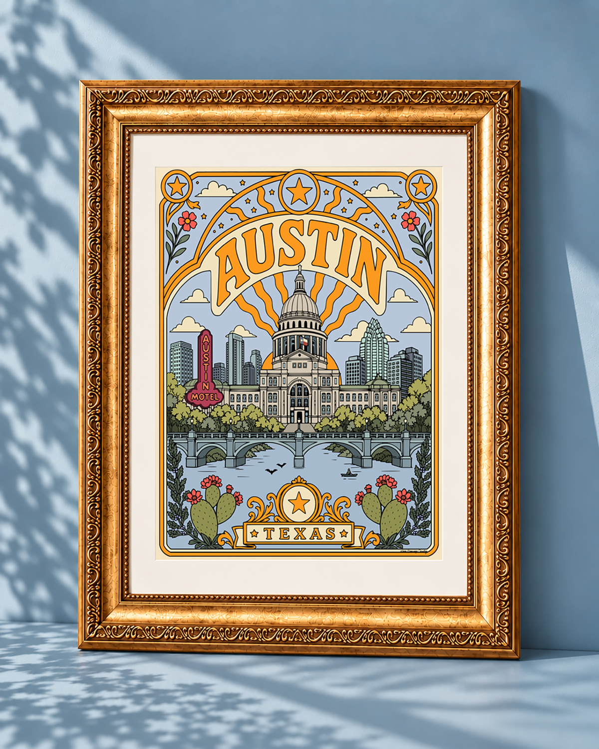 Austin Texas wall art displayed with a white mat in an ornate gold frame against a soft blue background.
