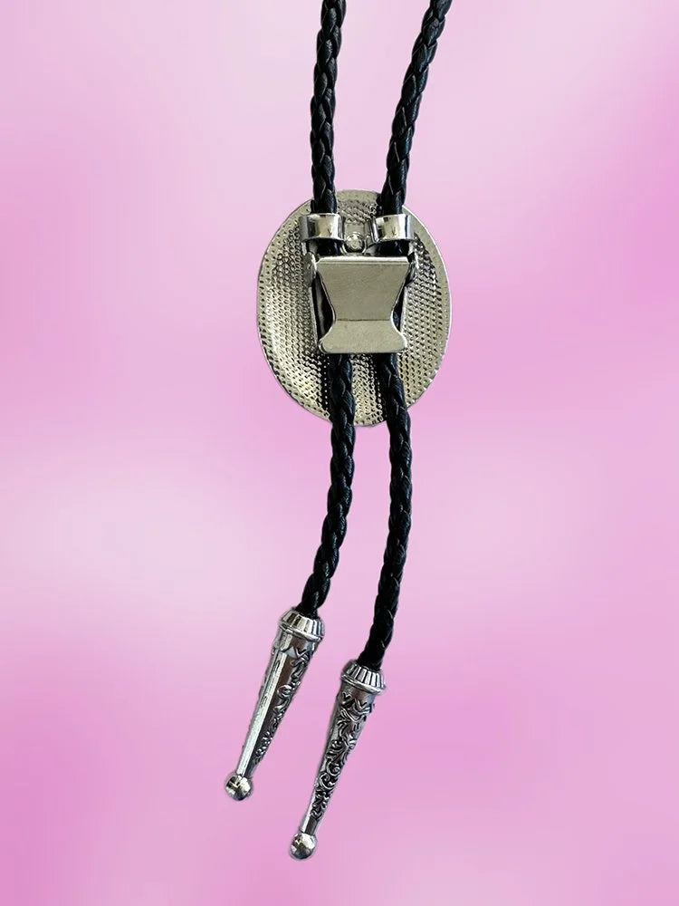 Back view of the Blazing Rose Bolo Tie showing the silver clasp hardware and braided black rope.