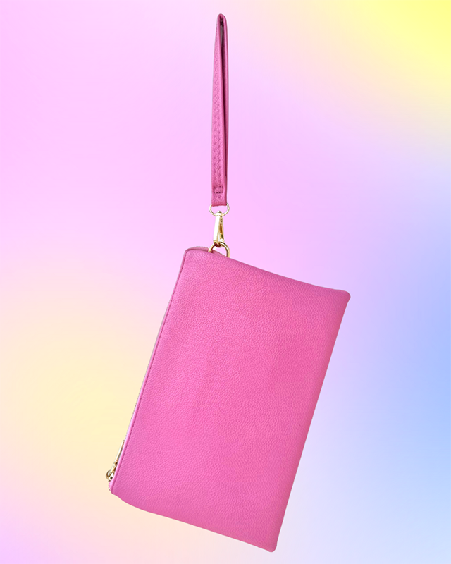 Back view of pink vegan-leather wristlet with detachable wrist strap.