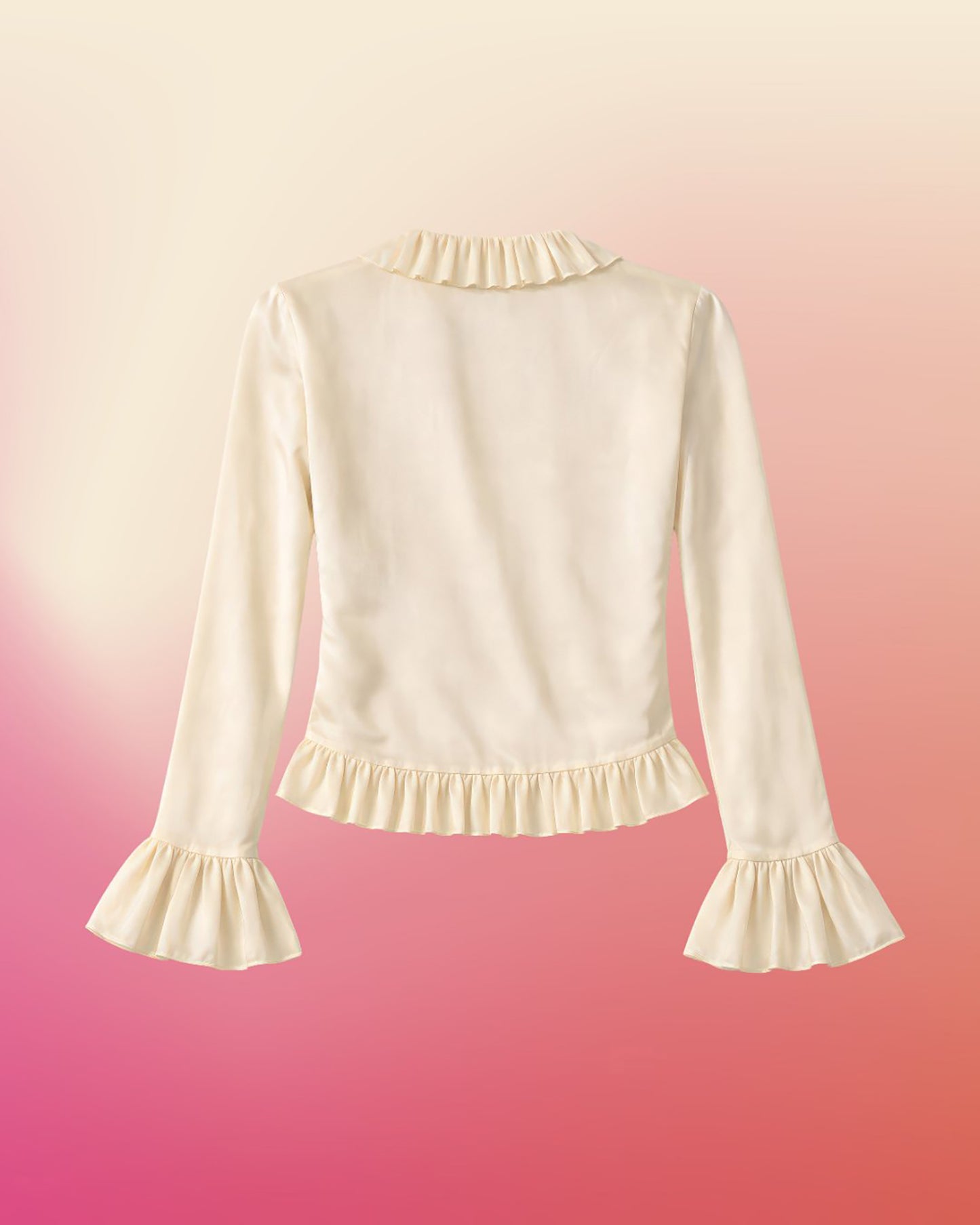 Back of cream silk blouse laid flat with smooth silk back, pleated neckline, and ruffled hem.