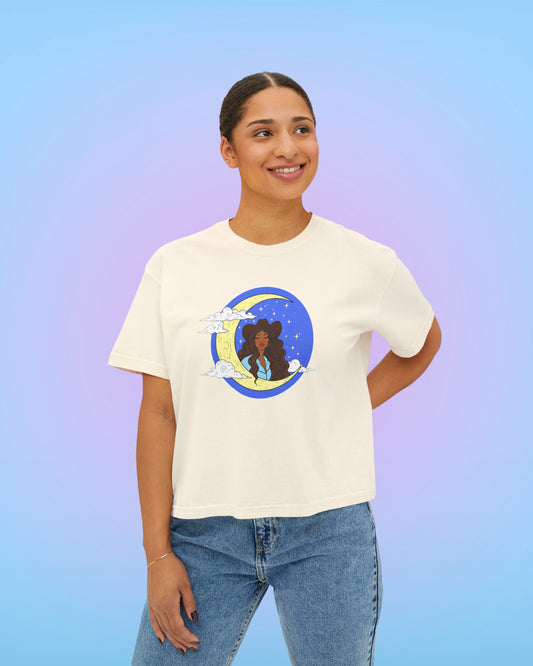 Model wearing ivory Crescent Moon Goddess cropped tee with relaxed boxy fit.