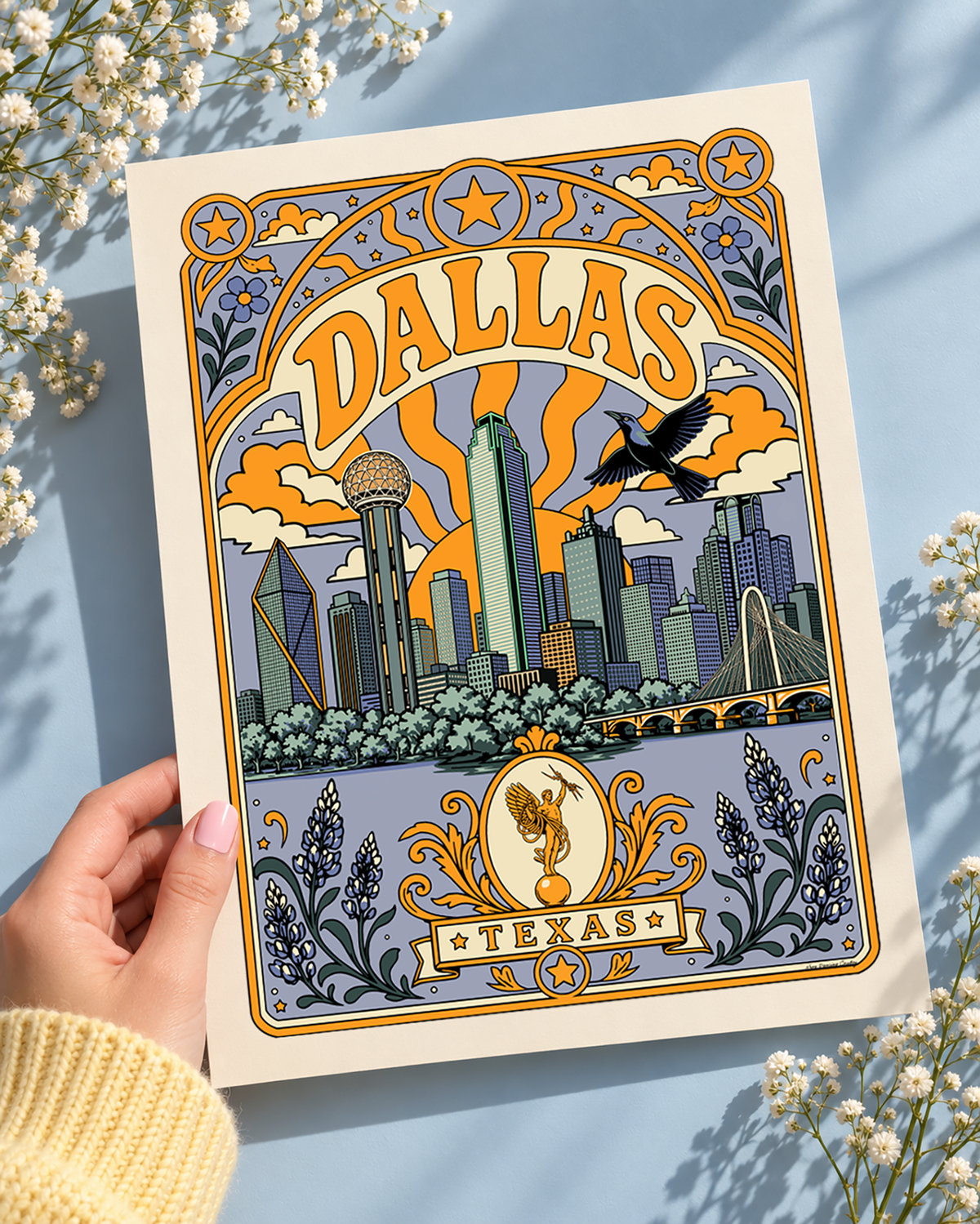 Dallas Texas skyline art print in periwinkle featuring Reunion Tower, downtown landmarks, bluebonnets and vintage-inspired typography.