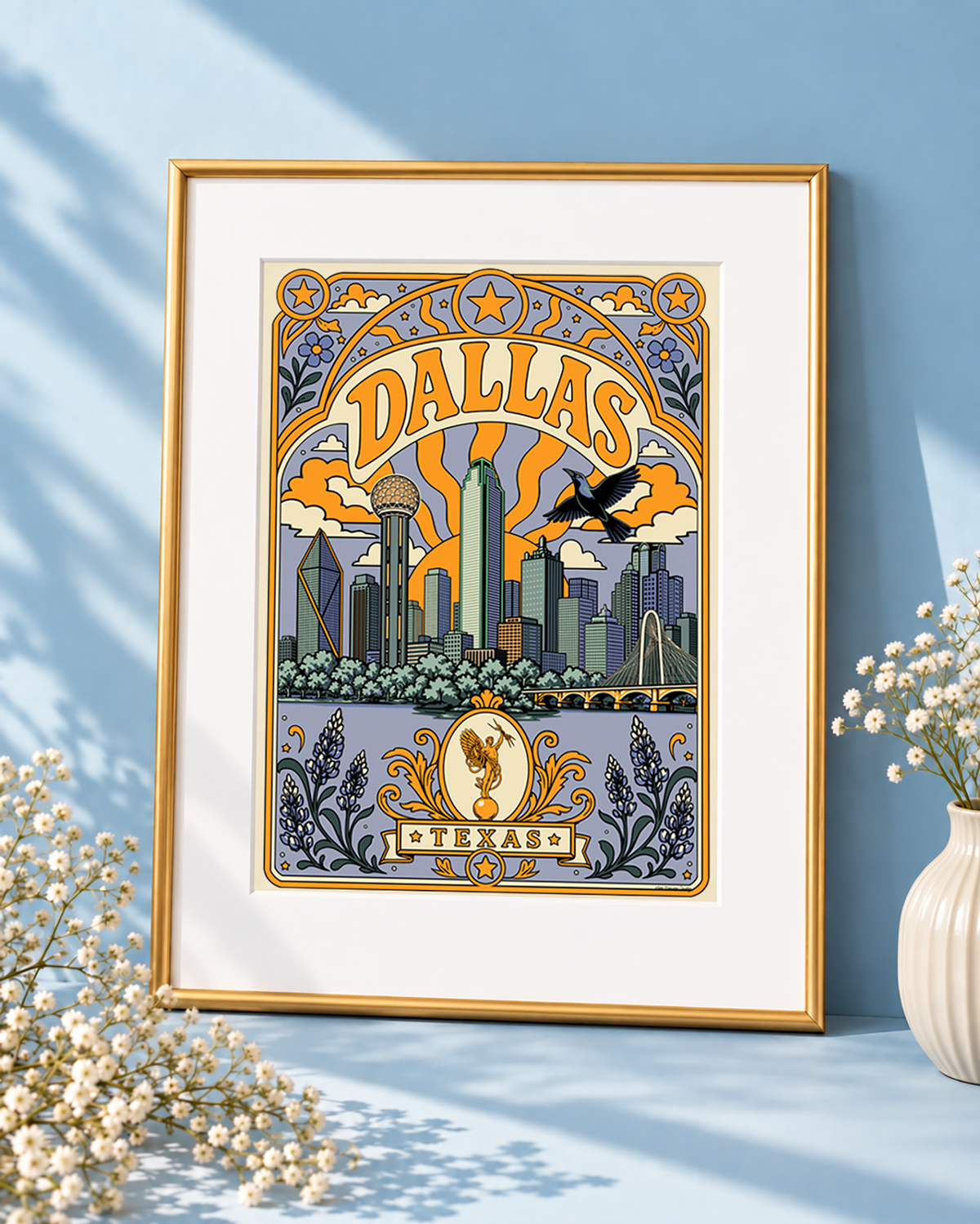 Dallas Texas wall art print displayed with a white mat in a modern thin gold frame against a soft blue background.