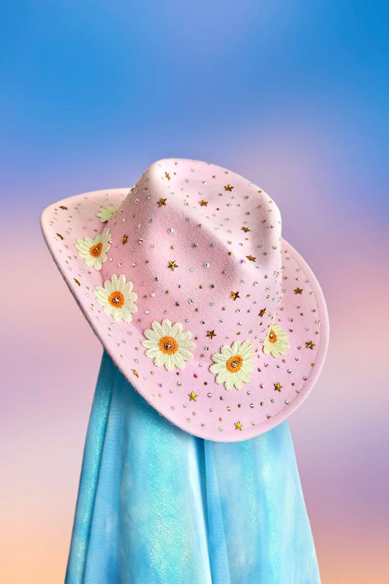 Front view of the Daisy Darling cowboy hat in baby pink with daisy motif, rhinestones, and glitter detailing.