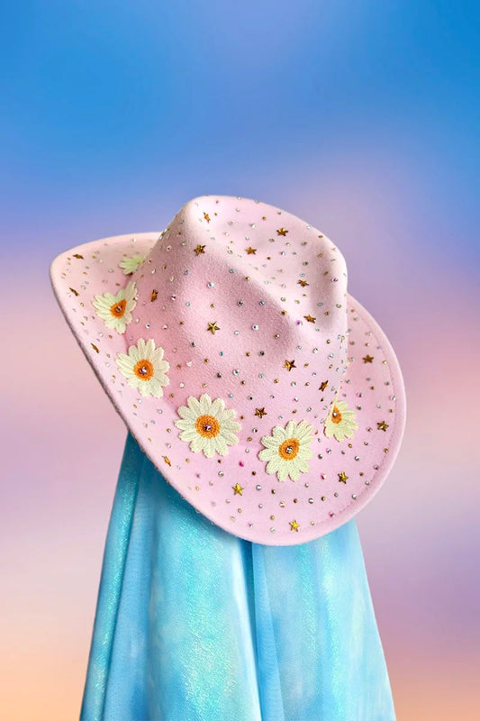 Front view of the Daisy Darling cowboy hat in baby pink with daisy motif, rhinestones, and glitter detailing.