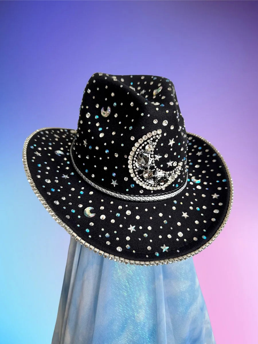 Front view of the Lunar Cowboy Hat with moon centerpiece and star-shaped rhinestones on a black base.