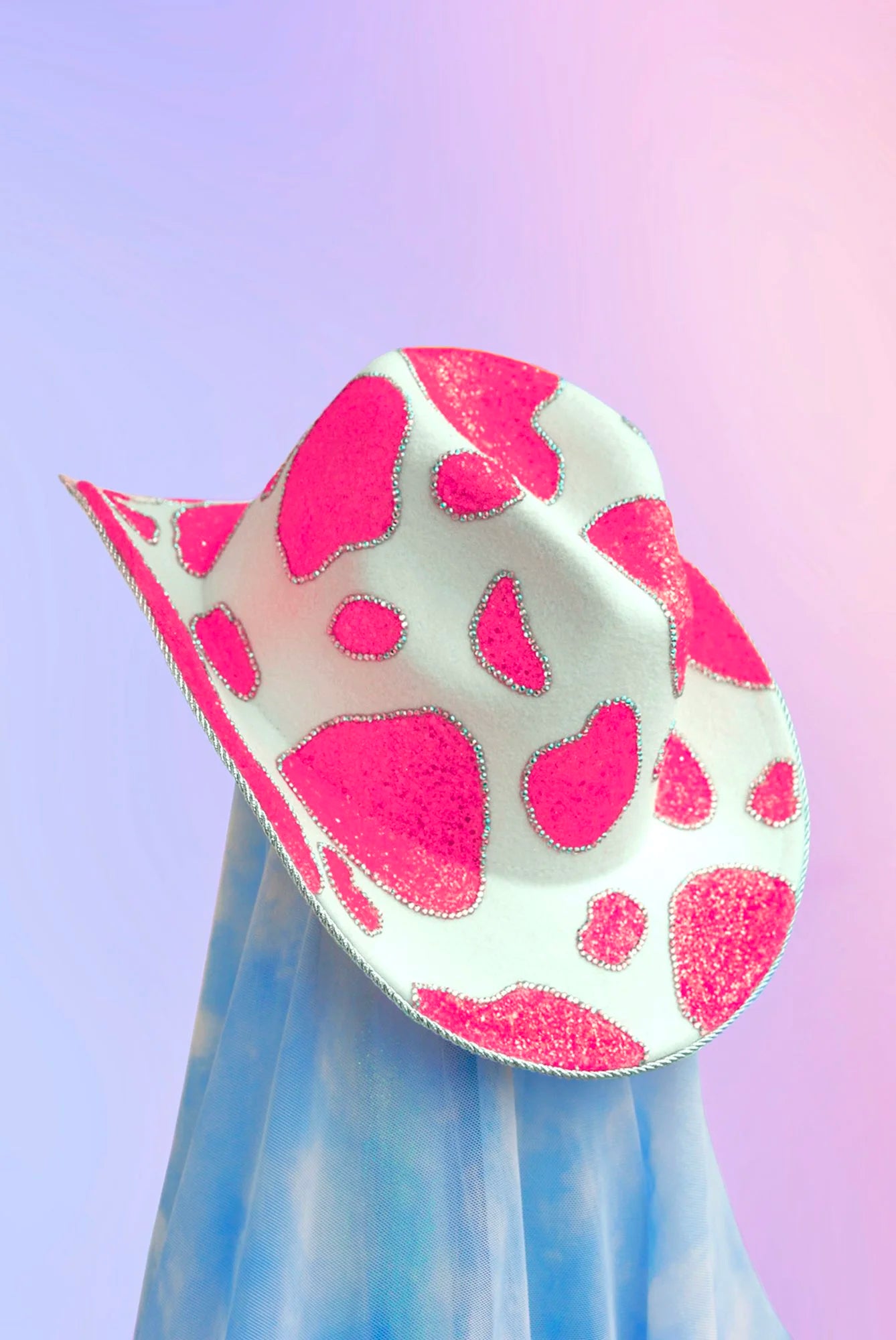 Front view of the Watermelon cowboy hat in neon pink with iridescent rhinestones, silver trim, and glitter brim.