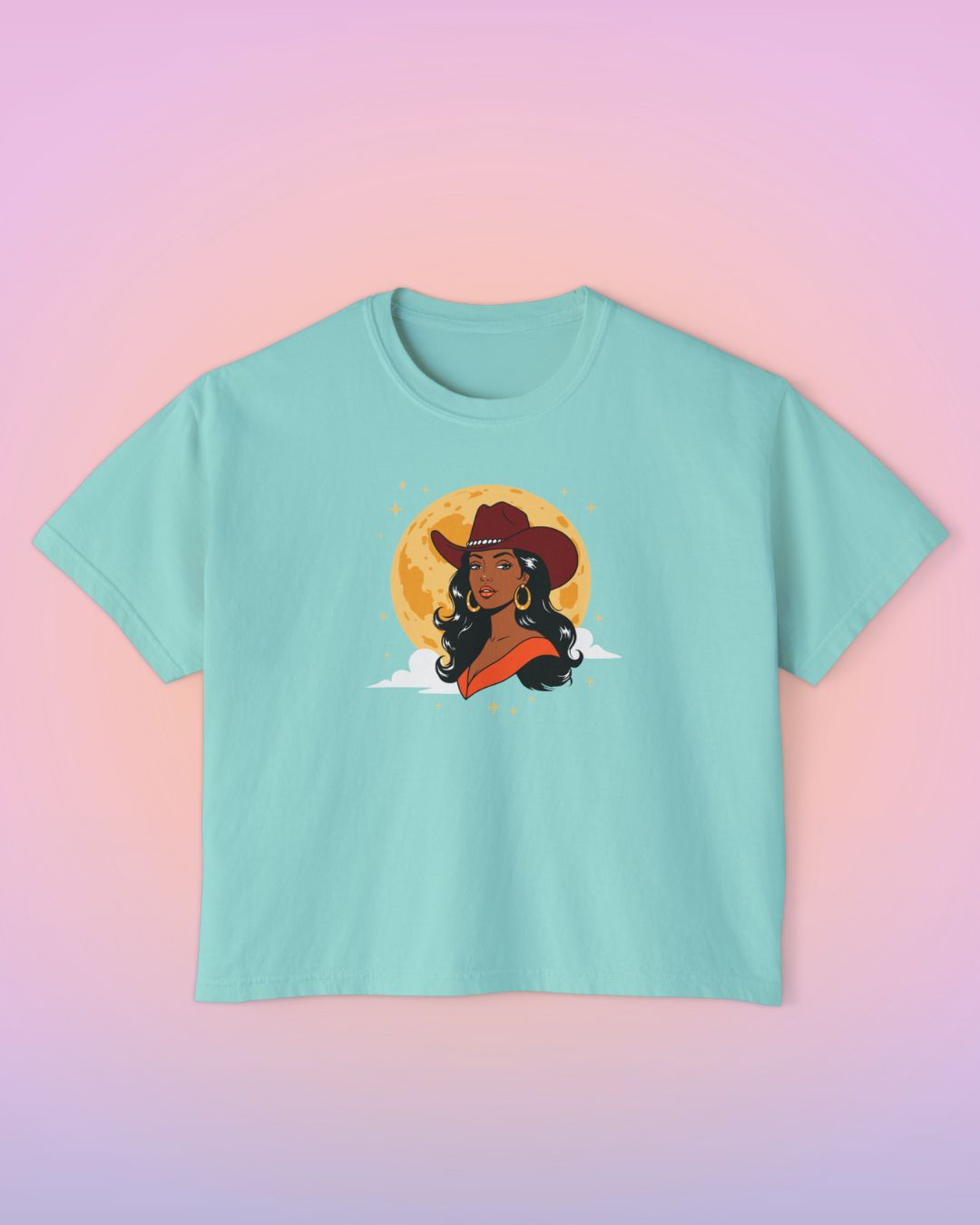 Chalky mint cropped tee with Full Moon Goddess cowgirl artwork inspired by western mysticism and desert nights.