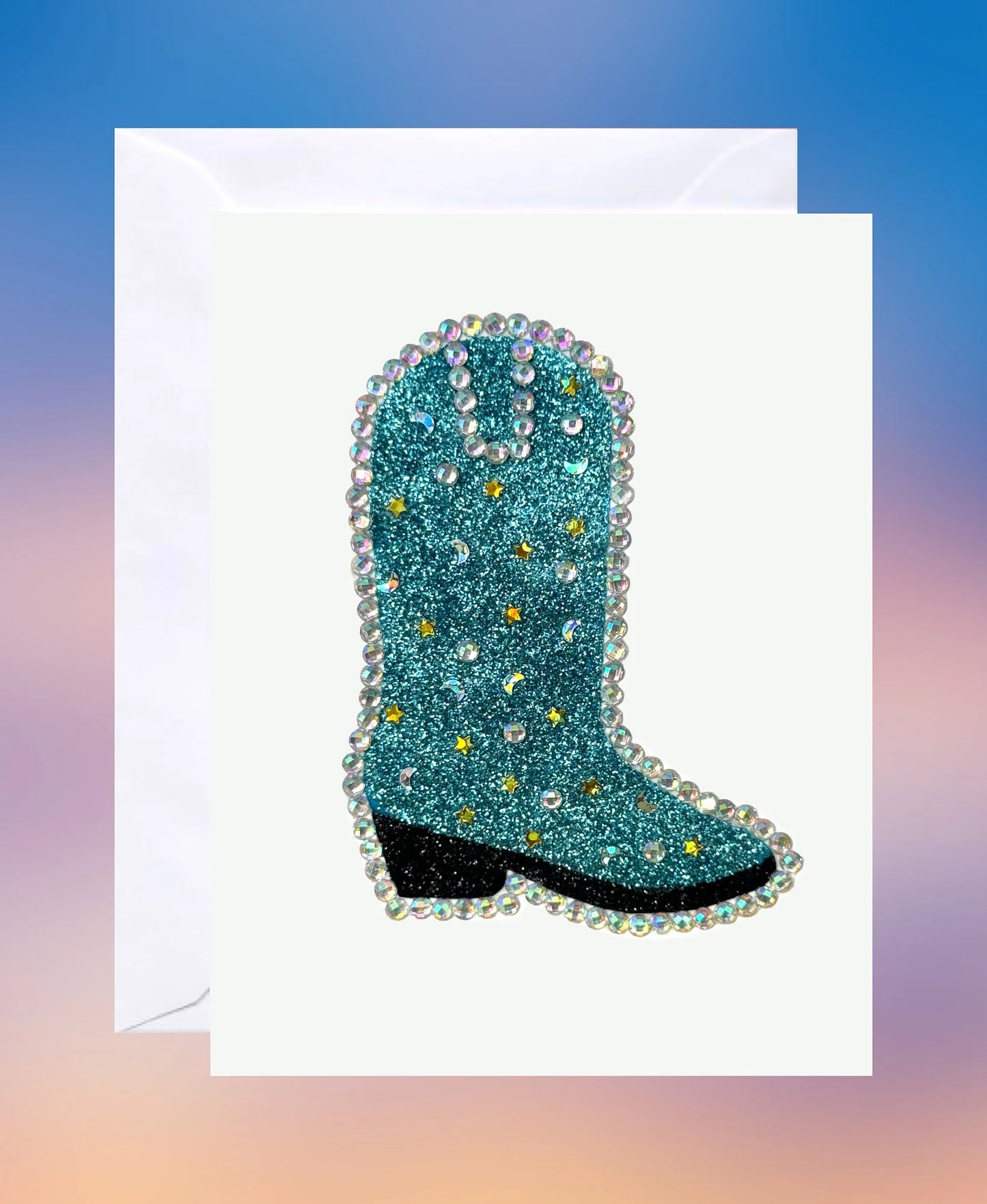 Sparkly teal rhinestone-studded cowboy boot design on a handmade greeting card.