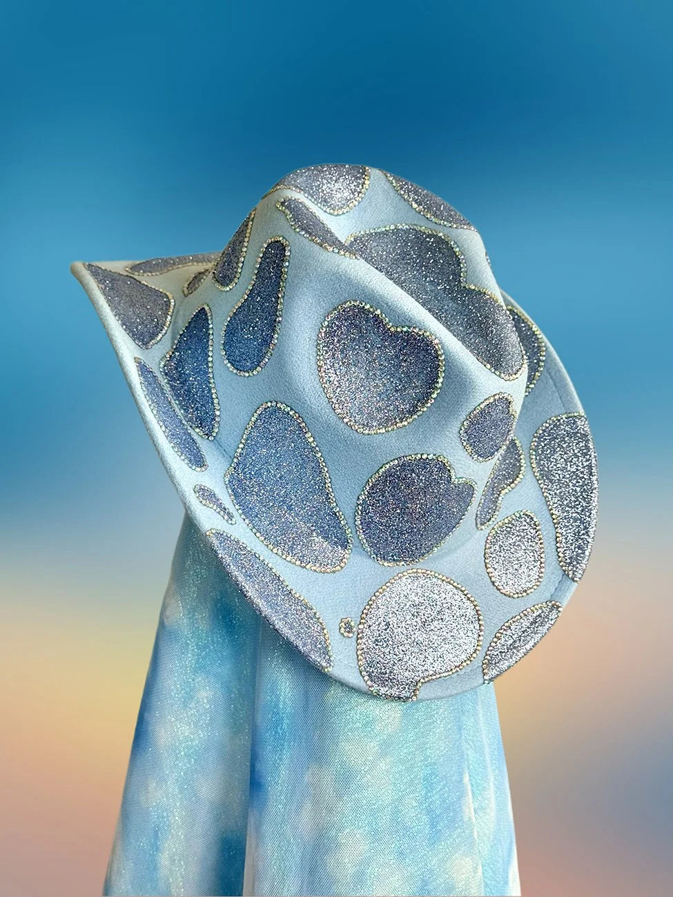 Baby blue cowboy hat with sealed glitter and rhinestone detailing, front view.