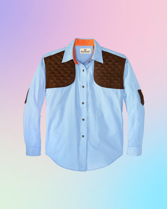 Front of light blue King Ranch western quilted shirt featuring dark brown padded shoulder panels and button-front design.