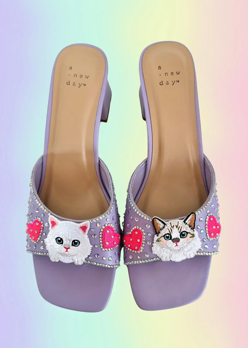 Top view of lavender kitten heels showing square toe design and vegan leather insole.