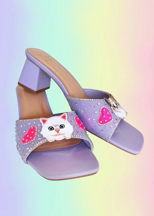 Lavender kitten-embellished heels with Pink hearts and rhinestones on the straps.