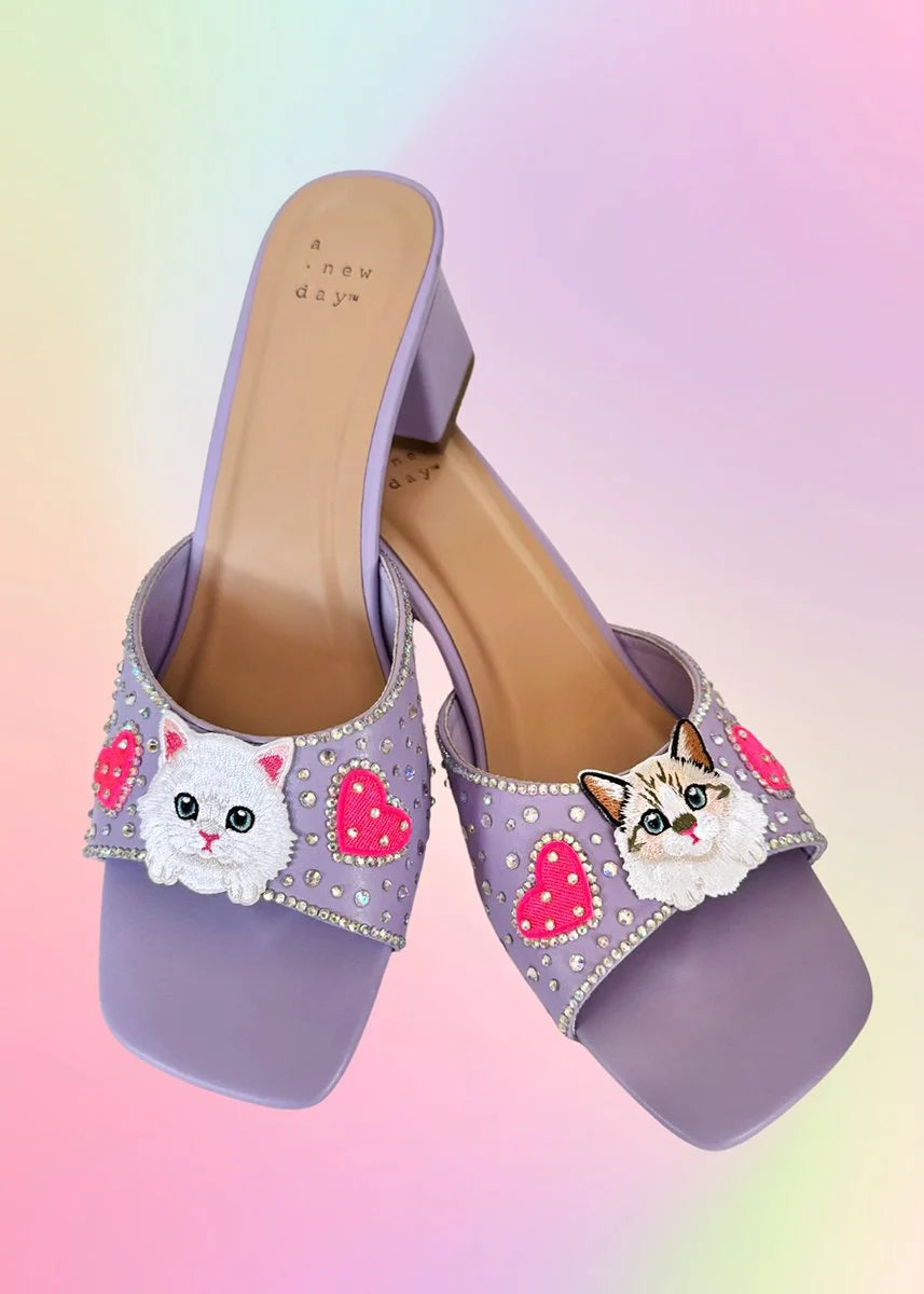 Lavender kitten-embellished heels with Pink hearts and rhinestones on the straps.