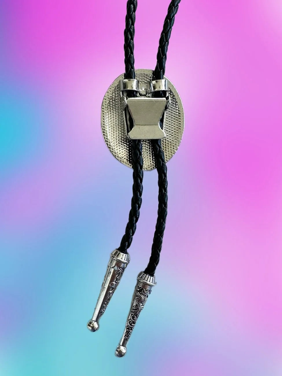 Back view of the Lemon Glow Bolo Tie showing the silver clasp hardware and braided black rope.