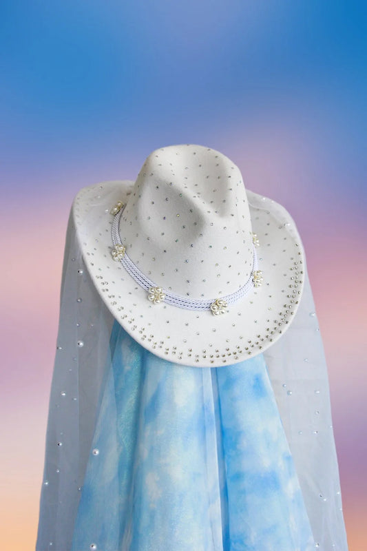 White cowboy hat with pearls rhinestones and tulle veil front view.