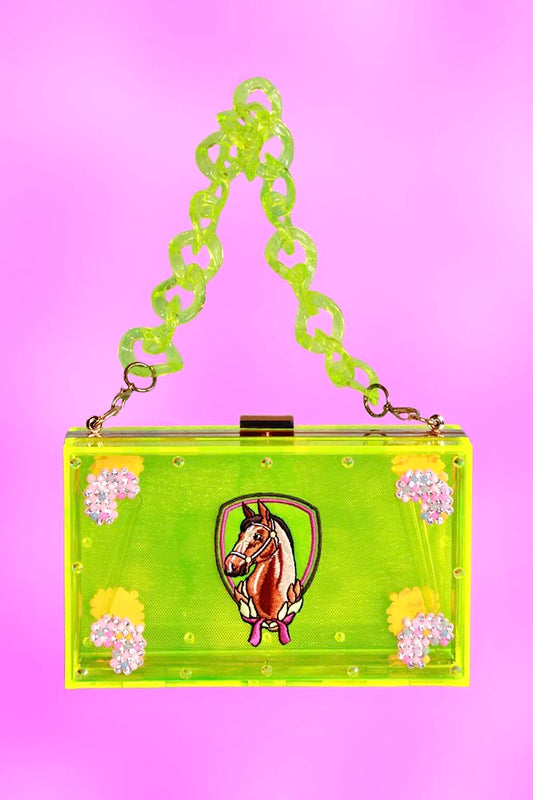 Neon-green acrylic clutch shown with short resin chain strap and pony emblem artwork.