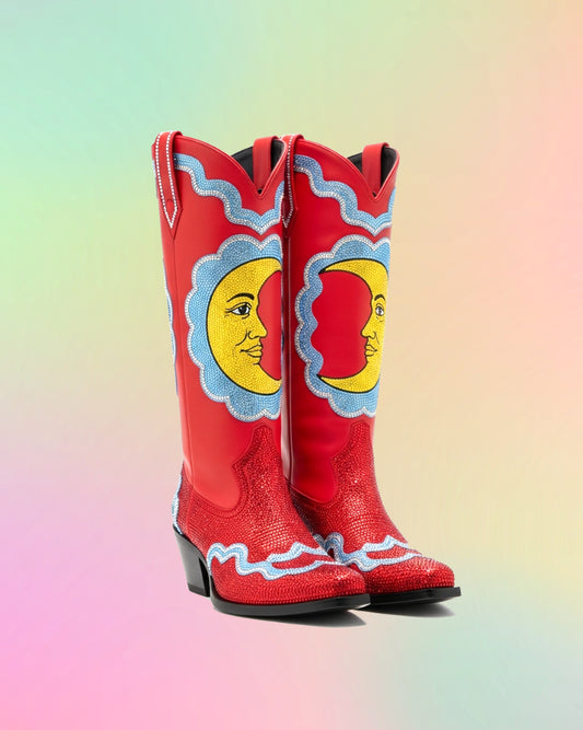 Front view of red hand painted knee high cowboy boots with yellow moon design and blue accents.