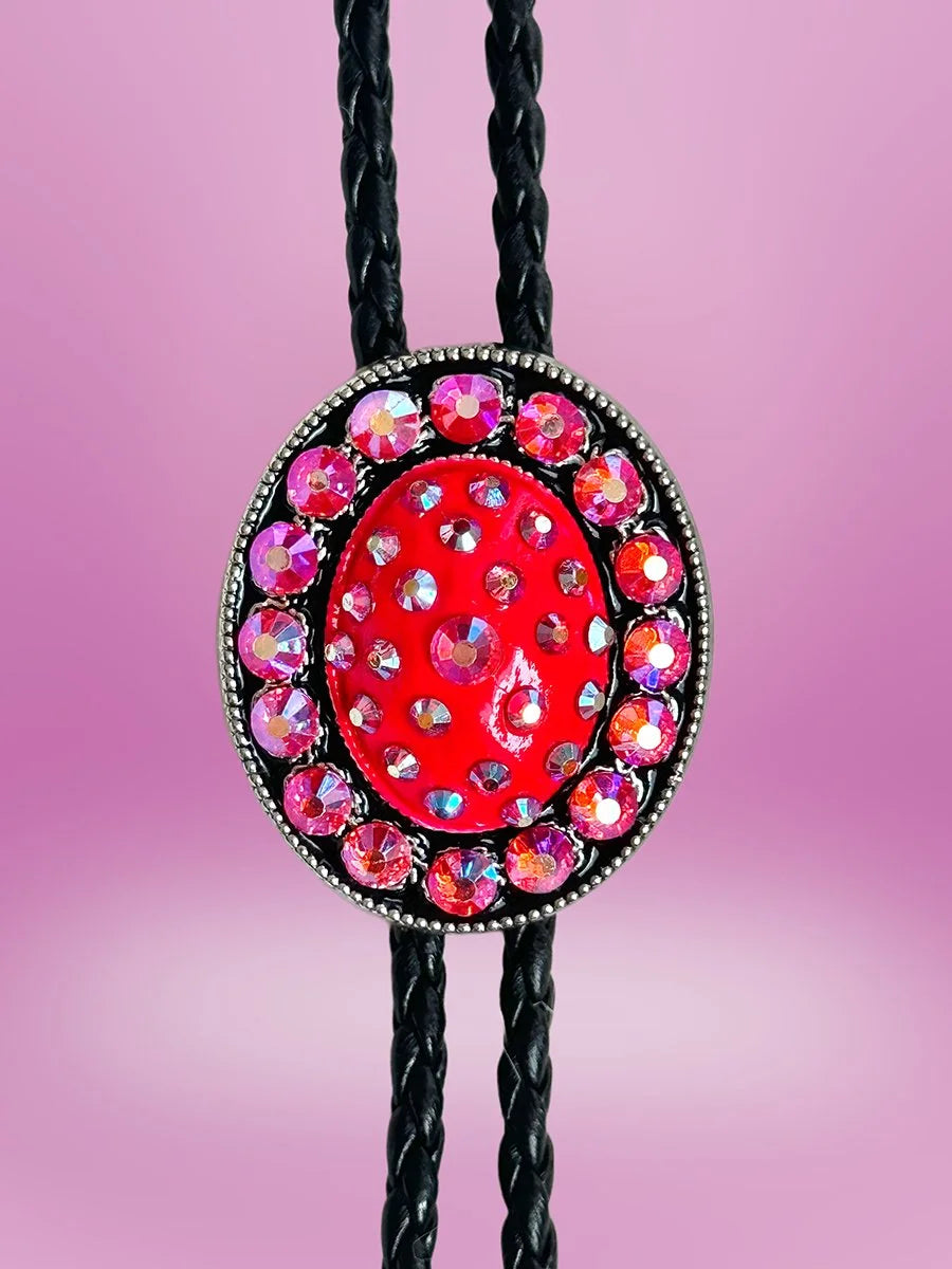 Closeup of the Prickly Pear Bolo Tie featuring a deep pink pendant surrounded by pink rhinestones.