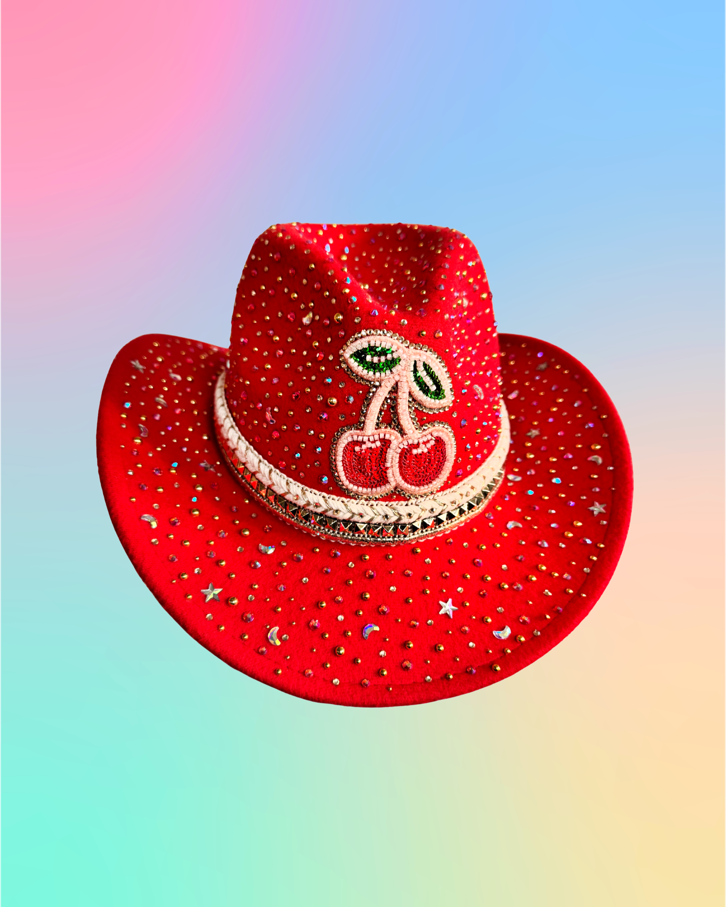 Red rhinestone cowboy hat with beaded cherry motif and wide brim, angled front view.