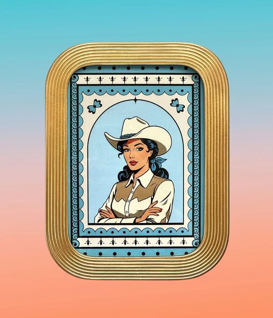 Framed cowgirl art print in a scalloped gold retro frame on a pastel gradient background.