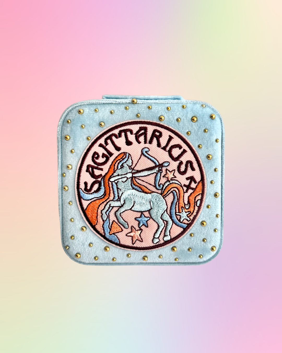 Sagittarius velvet zodiac jewelry box with embroidered zodiac patch and gold rhinestone details.