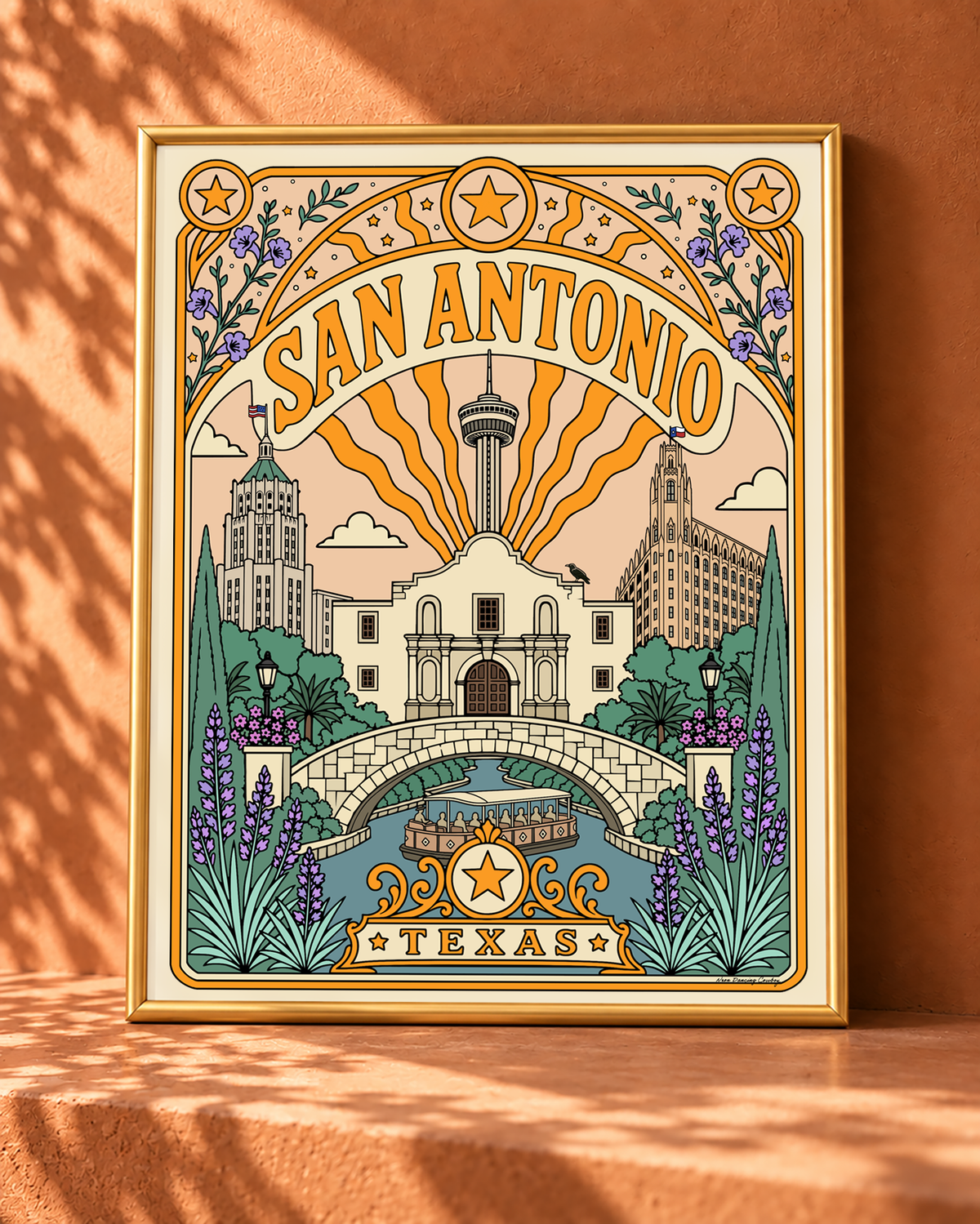 San Antonio Texas art print displayed without a mat in a slim gold frame with a narrow cream border.
