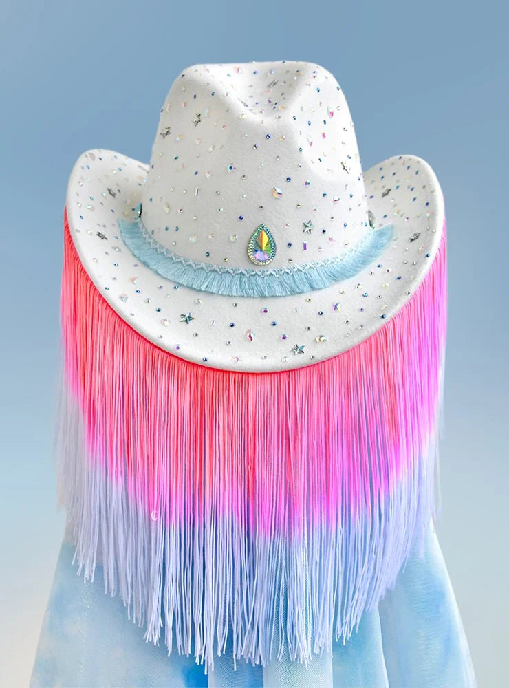 Close-up of rhinestones and star embellishments on showgirl cowboy hat.