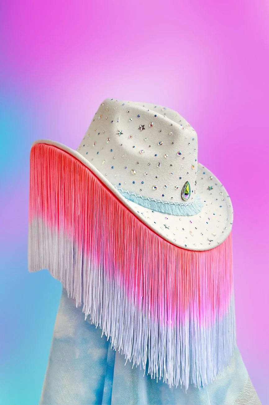 Showgirl cowboy hat with pink and white fringe and rhinestone accents.