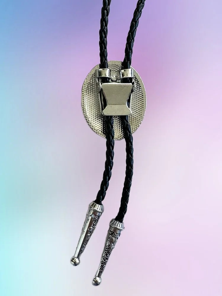 Back view of the Skyward Bolo Tie showing the silver slide clasp and braided black rope.