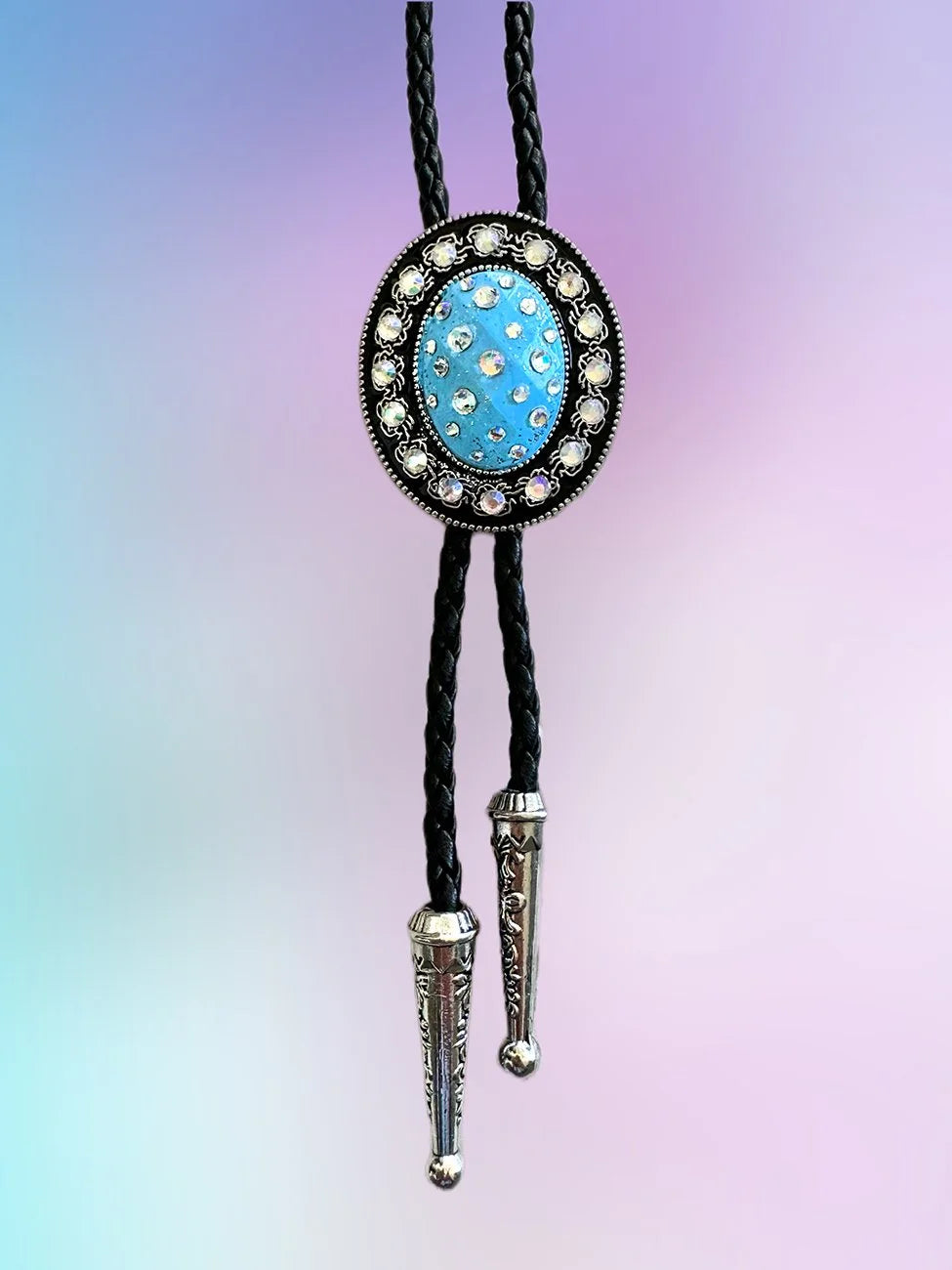 Full-length front view of the Skyward Bolo Tie with sky-blue pendant, rhinestones, and silver tips.