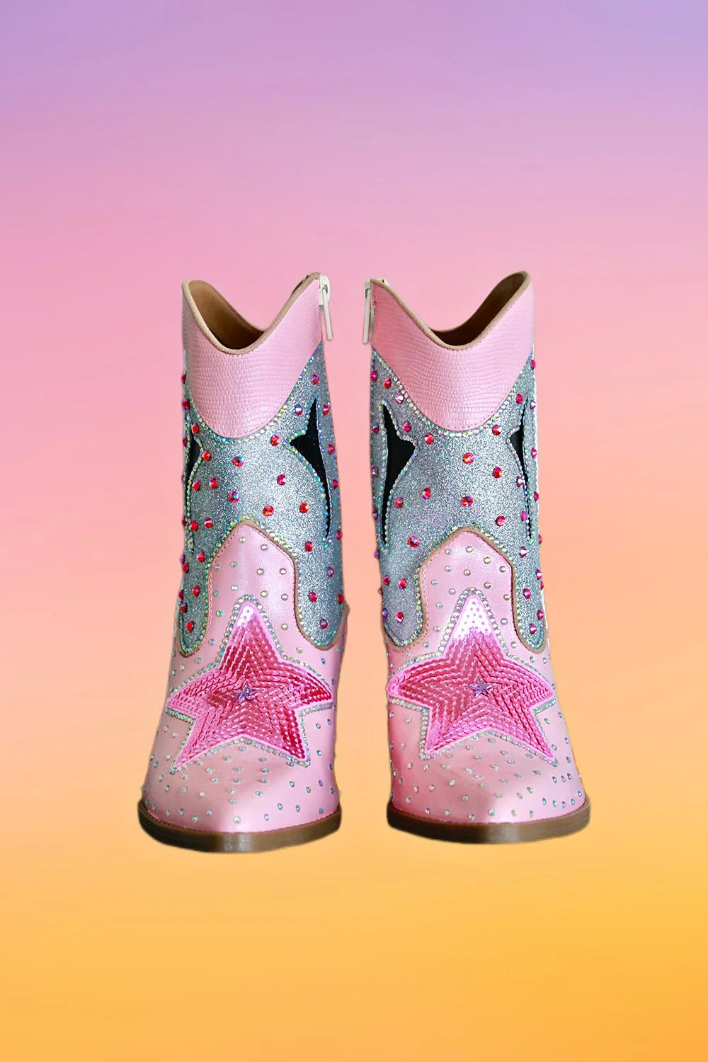 Front view of pink hand painted ankle cowboy boots with silver glitter panels rhinestones and star detailing.