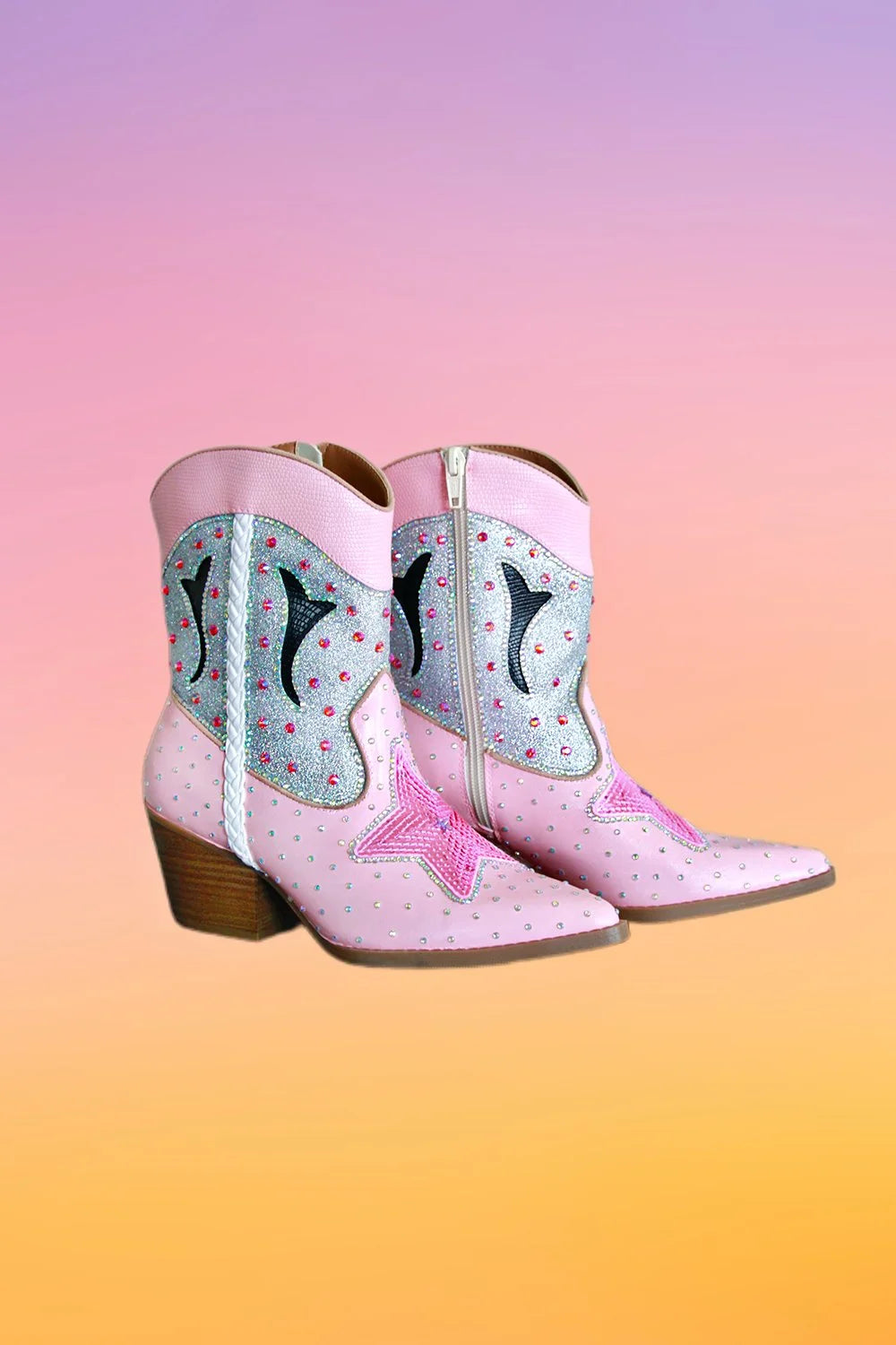 Full side view of pink hand painted ankle cowboy boots with silver glitter panels rhinestones and star detailing.