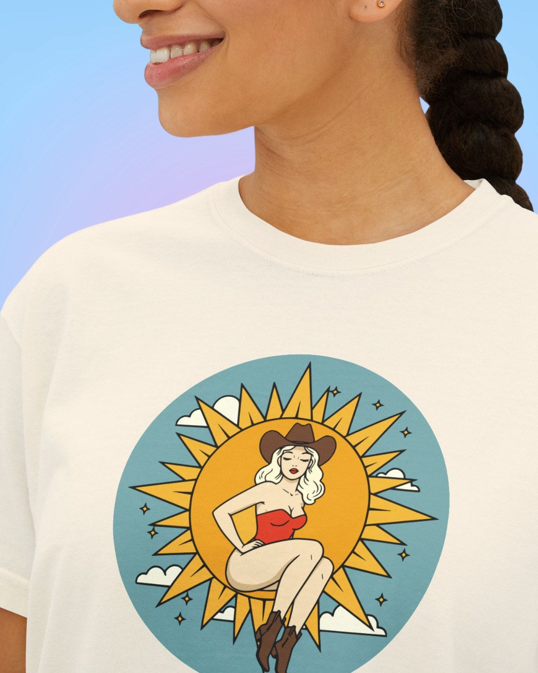 Close-up of Sun Goddess illustrated artwork with softly faded vintage-style print.