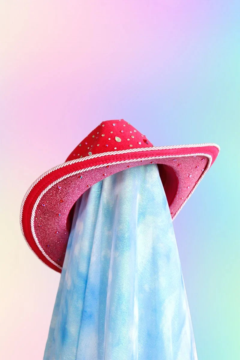 Underside of unicorn dream cowboy hat with sealed rose pink glitter and rhinestones.