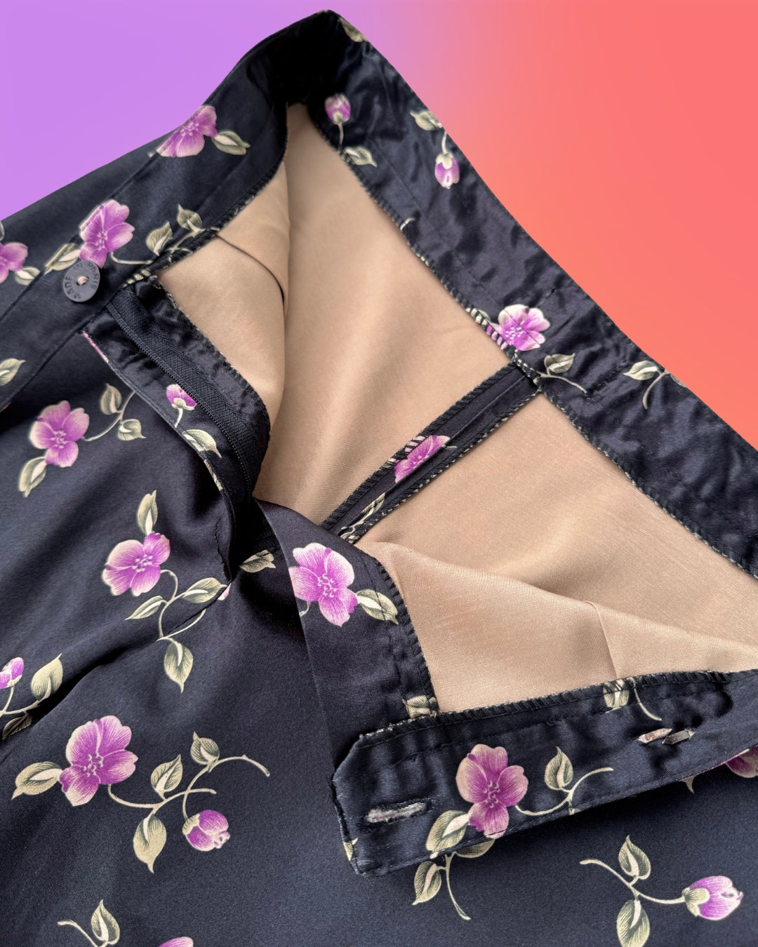 Interior construction detail of vintage 1990s Parisian floral satin capri pants.