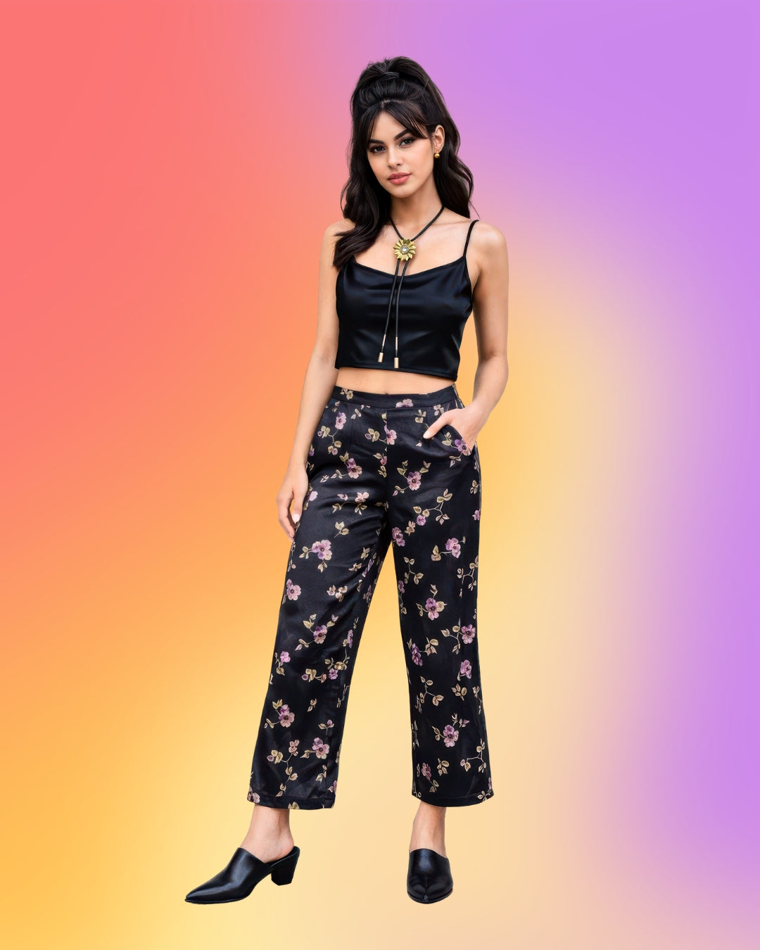 Petite model wearing vintage 1990s Parisian floral satin capri pants styled with black satin top and cowboy mule heels.