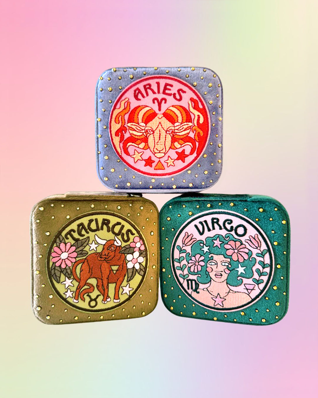 Aries, Taurus, Virgo velvet zodiac jewelry boxes with embroidered zodiac patches and gold bead details.